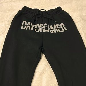 Black Comfortable Sweatpants. Daydreamer Logo.